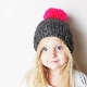 Children's hats with pompoms