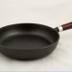 How to clean the cast-iron pan from soot at home?