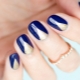 Blue Manicure with Gold Design