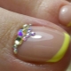 Beautiful pedicure french with rhinestones