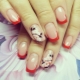 Red french on the nails: the choice of color and combination of colors