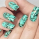 Manicure in black and turquoise colors: beauty and style