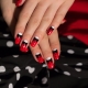 Unusual manicure ideas in a combination of white, red and black tones