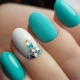 Manicure design features in turquoise tones
