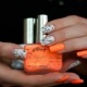 Bright and unusual ideas combining white with orange shades in manicure