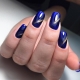 Manicure cat eye in blue shades
