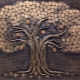 Picture of a money tree made of coins with their own hands