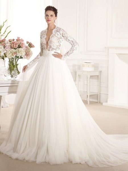 Magnificent wedding dress with a deep neckline