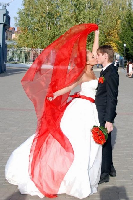 Red veil with a red belt dress