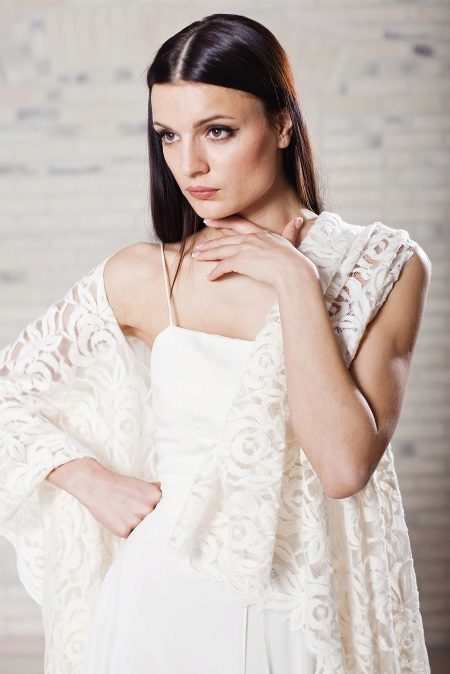 A rustic wedding dress with a shawl