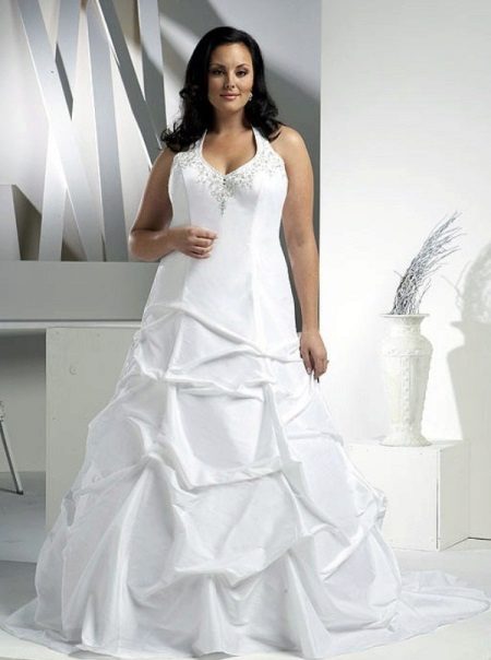 Wedding dress for magnificent with the decorated bodice and a skirt