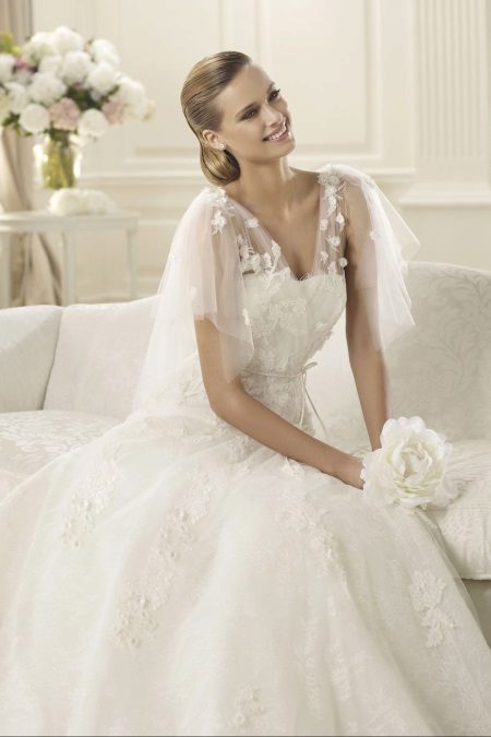 Lace wedding dress with closed top