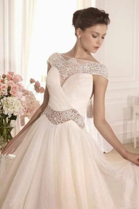 Wedding dress with lace inserts