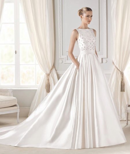 Wedding fluffy dress with a closed neckline