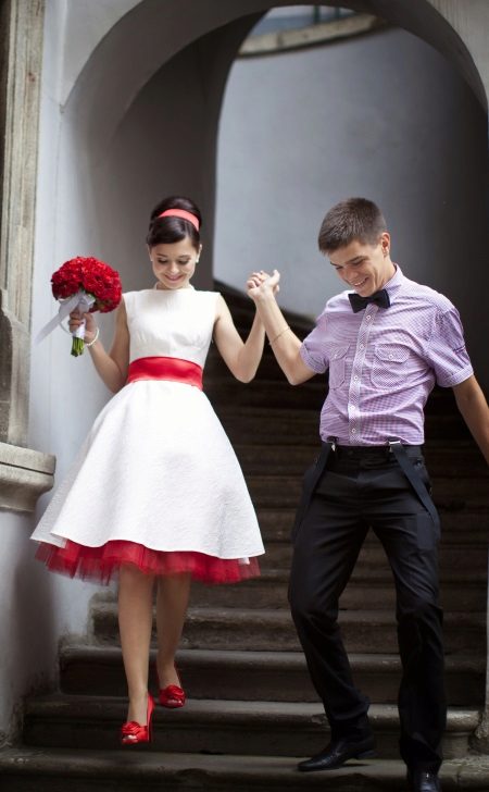 Wedding dress with a red belt and petticoats