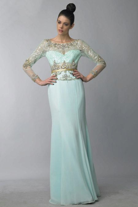 Evening gown of mint color with pastel notes