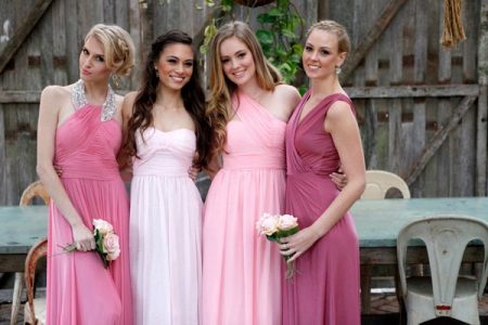 Dresses of different shades of pink for bridesmaids