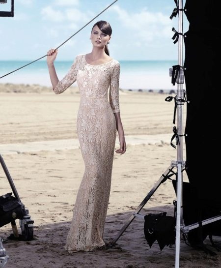 Floor length evening dress with lace sleeves