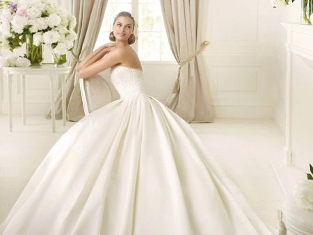 A magnificent satin wedding dress