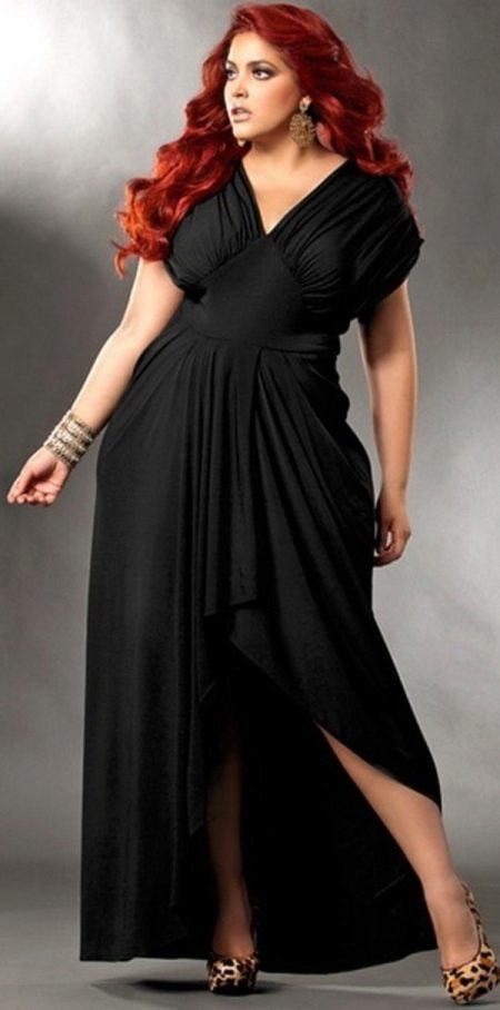 Black evening dress for the full long with an asymmetric skirt