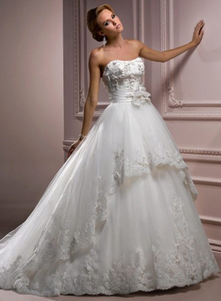 Wedding dress with a decor on a corset