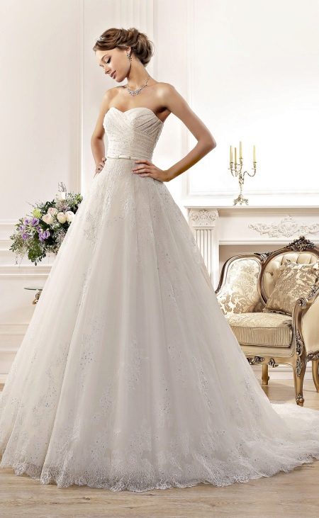 Wedding dress from the Idylly collection by Naviblue Bridal with a train