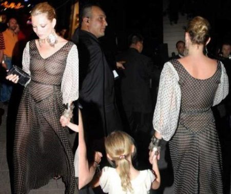 Kate Mos in a transparent polka dot evening dress
