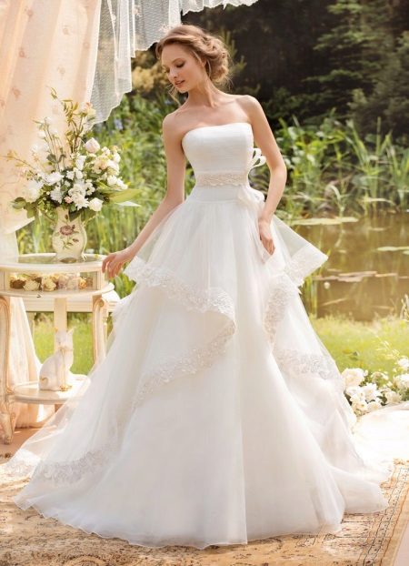 Classic lush wedding dress with a multi-layered skirt