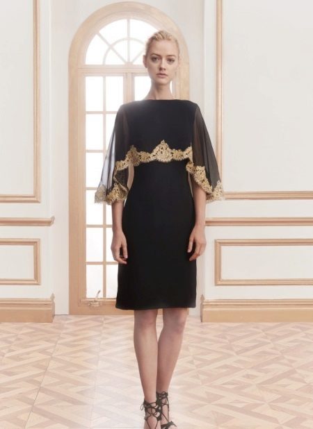 Short evening dress with a cape