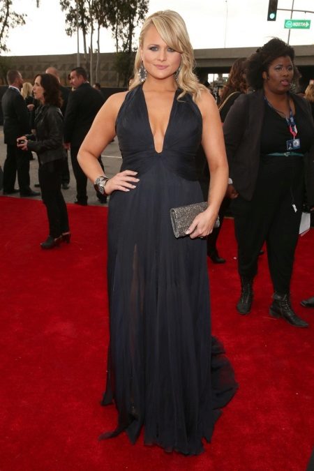 Black long dress in a floor with a deep neckline for pregnant women