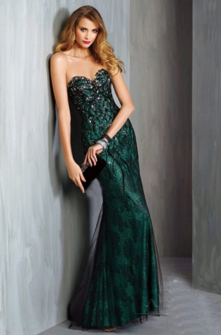 Lacy black dress with a green lining