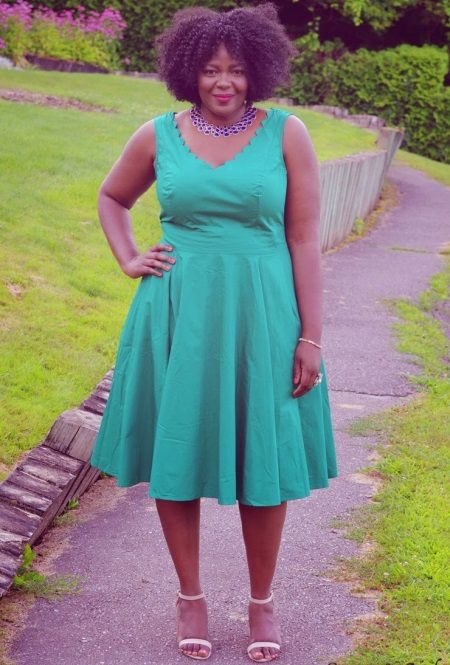 Open green dress with A-shape for obese women