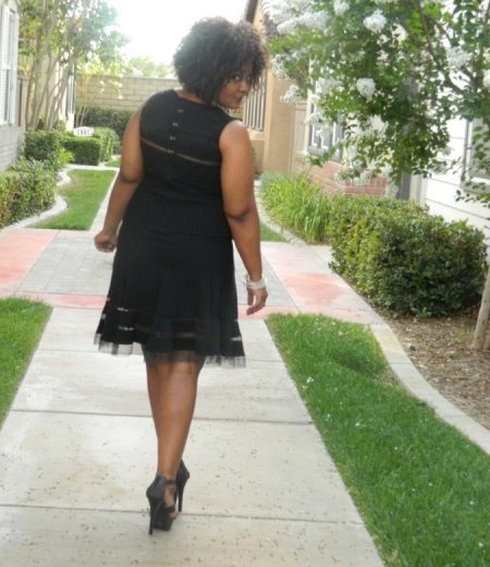 Black office dress for full and high-heeled shoes to him