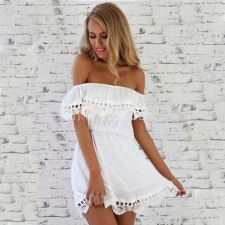 White dress of batista with frills