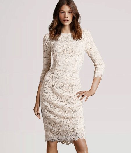  Medium length lace wedding dress with three-quarter sleeves