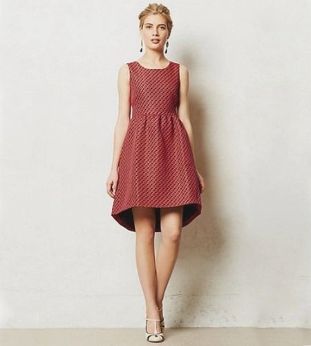 Dress with a skirt bell with an asymmetrical bottom