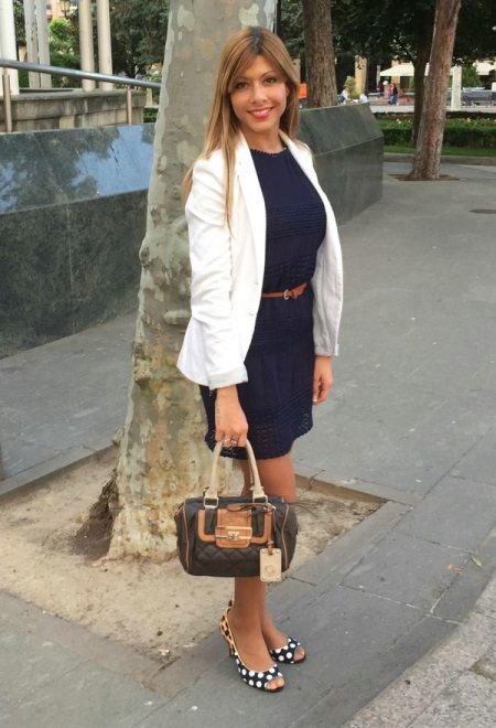 White accessories to dark blue dress