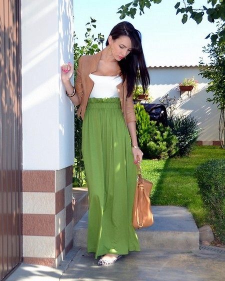 Long green skirt half sun in combination with a jacket